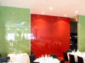 Commercial painted back coloured glass wall cladding designed and manufactured in derry city and supplied to northern ireland direct to trade.png