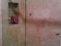 Simple slideing glass shower splash guard and shower door made to measure in northern ireland.png