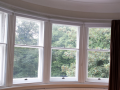 secondary glazing supplier in ireland Vertical balanced sliding Secondary glazing window made to measure in ireland custom made glass installed by glaziers in ireland